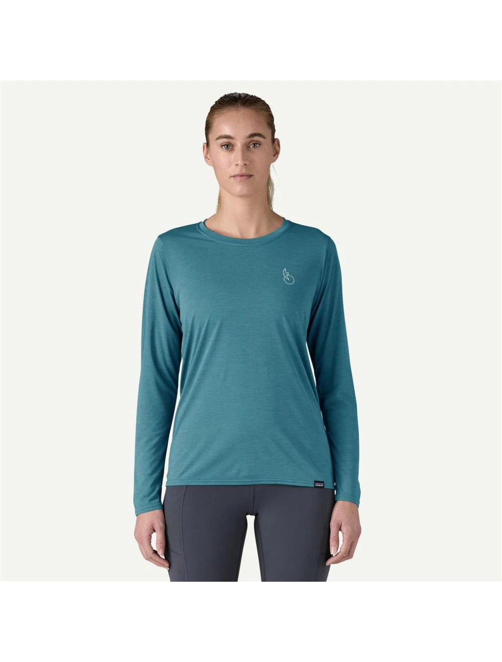 That is a Rash Guard Patagonia W's L/S Cap Cool Daily Graphic Shirt - Waters Swelldrifter: Wetland Blue X-Dye