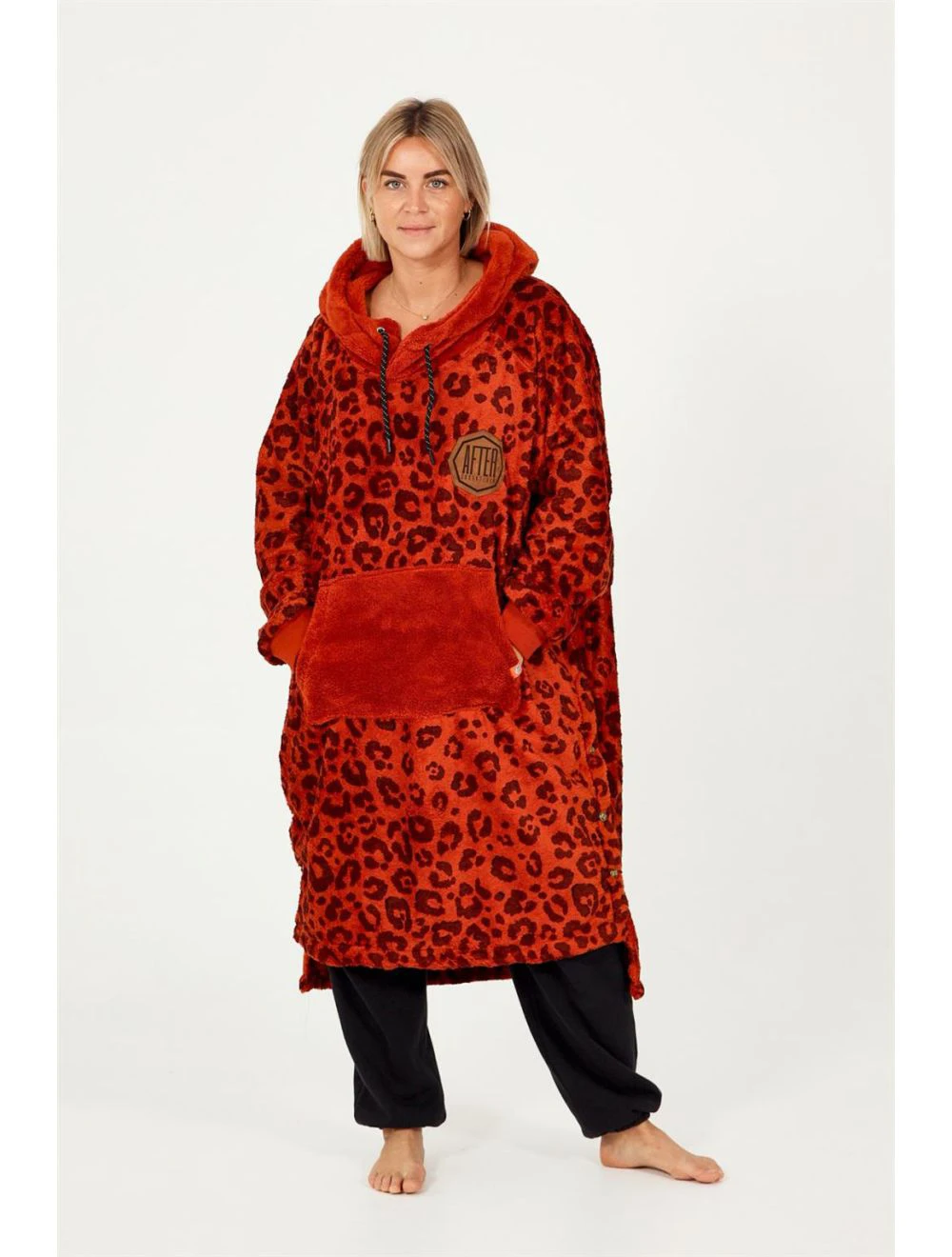 That is a Poncho; Towel After Essentials Sofa leopard